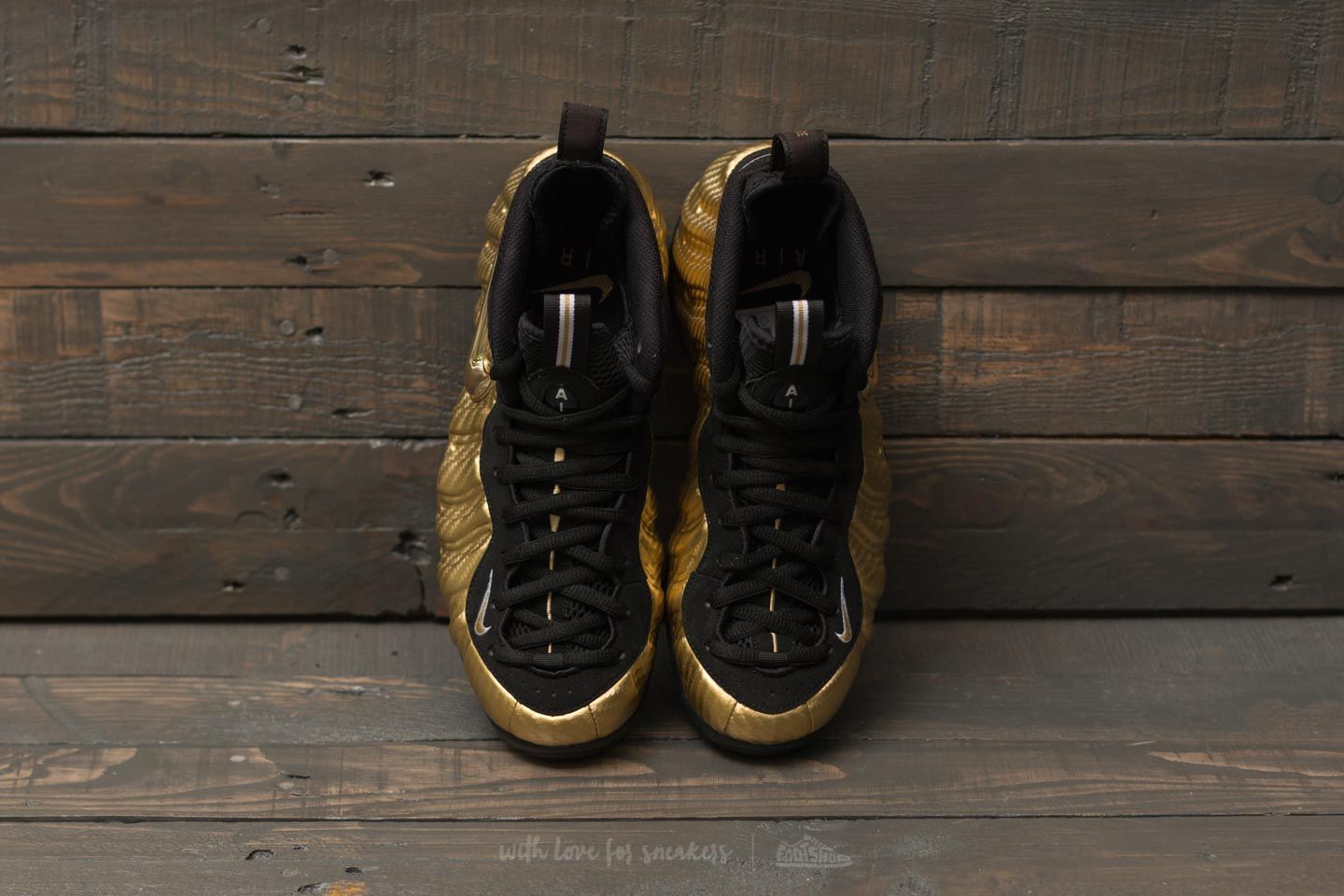 Metallic gold clearance and black foamposites