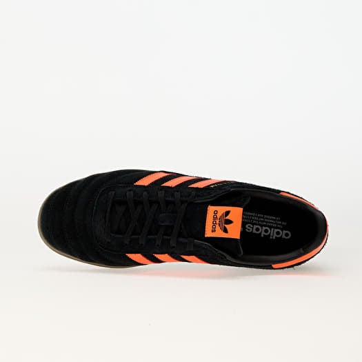 Adidas black orange trainers online