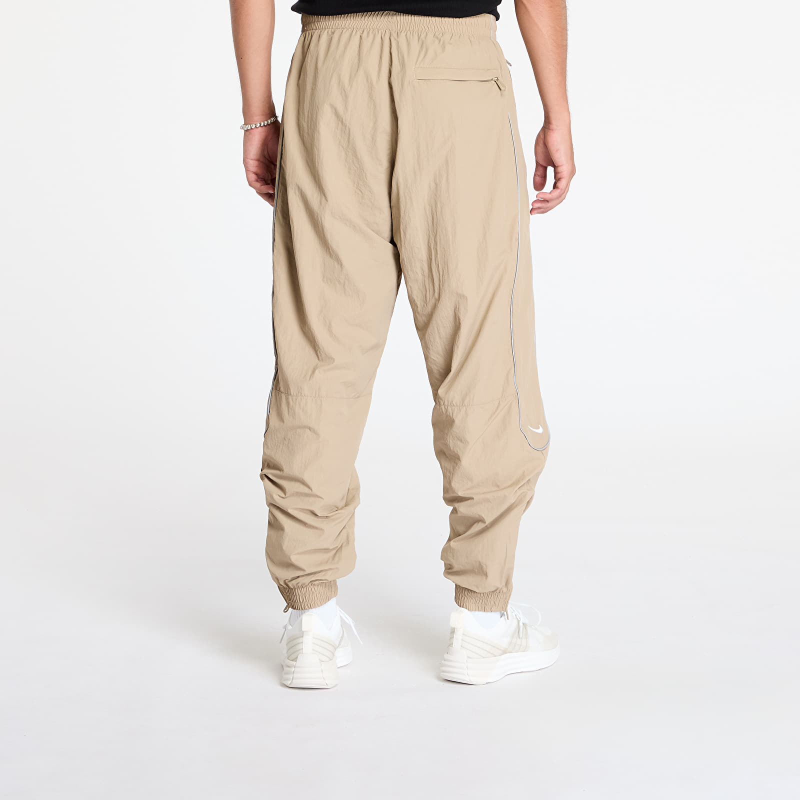 Džíny a kalhoty Nike Solo Swoosh Men's Track Pants Khaki/ White