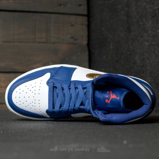 Royal blue store and gold jordans