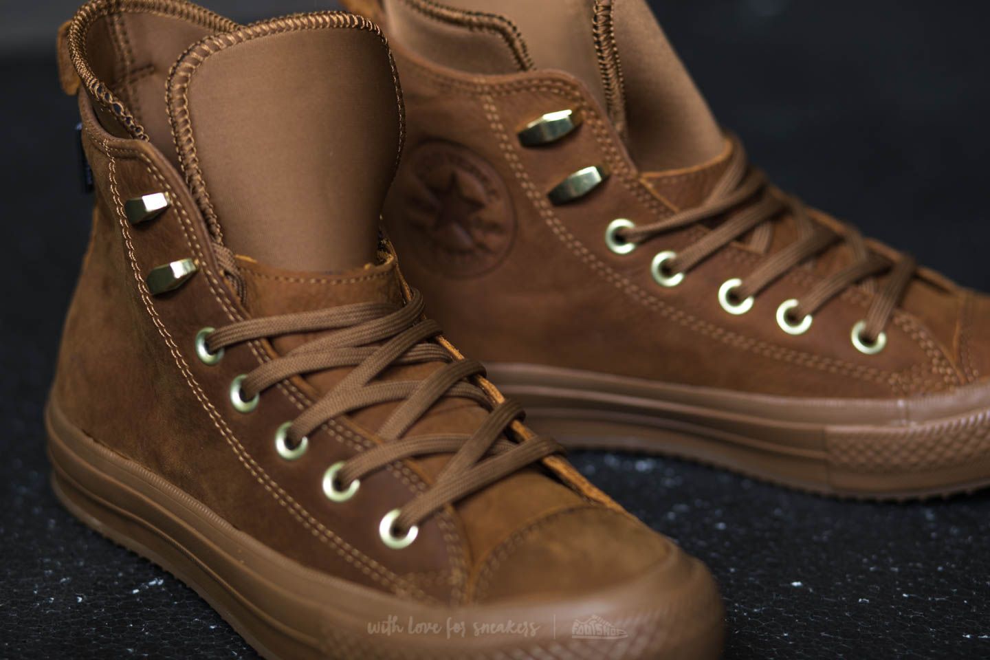 Converse waterproof brown top
