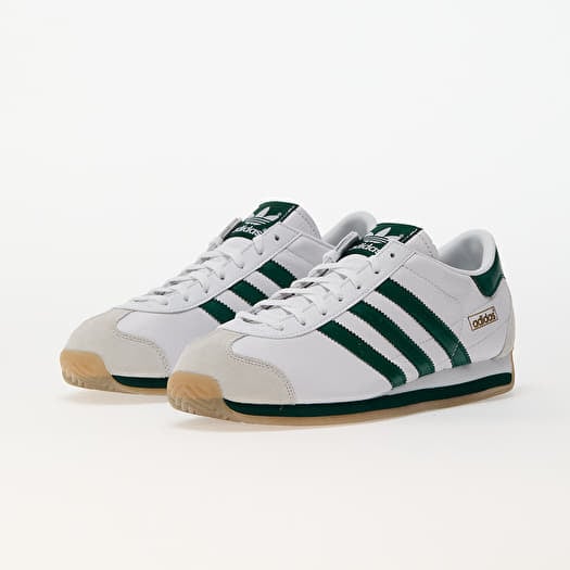 Green and white adidas trainers best sale