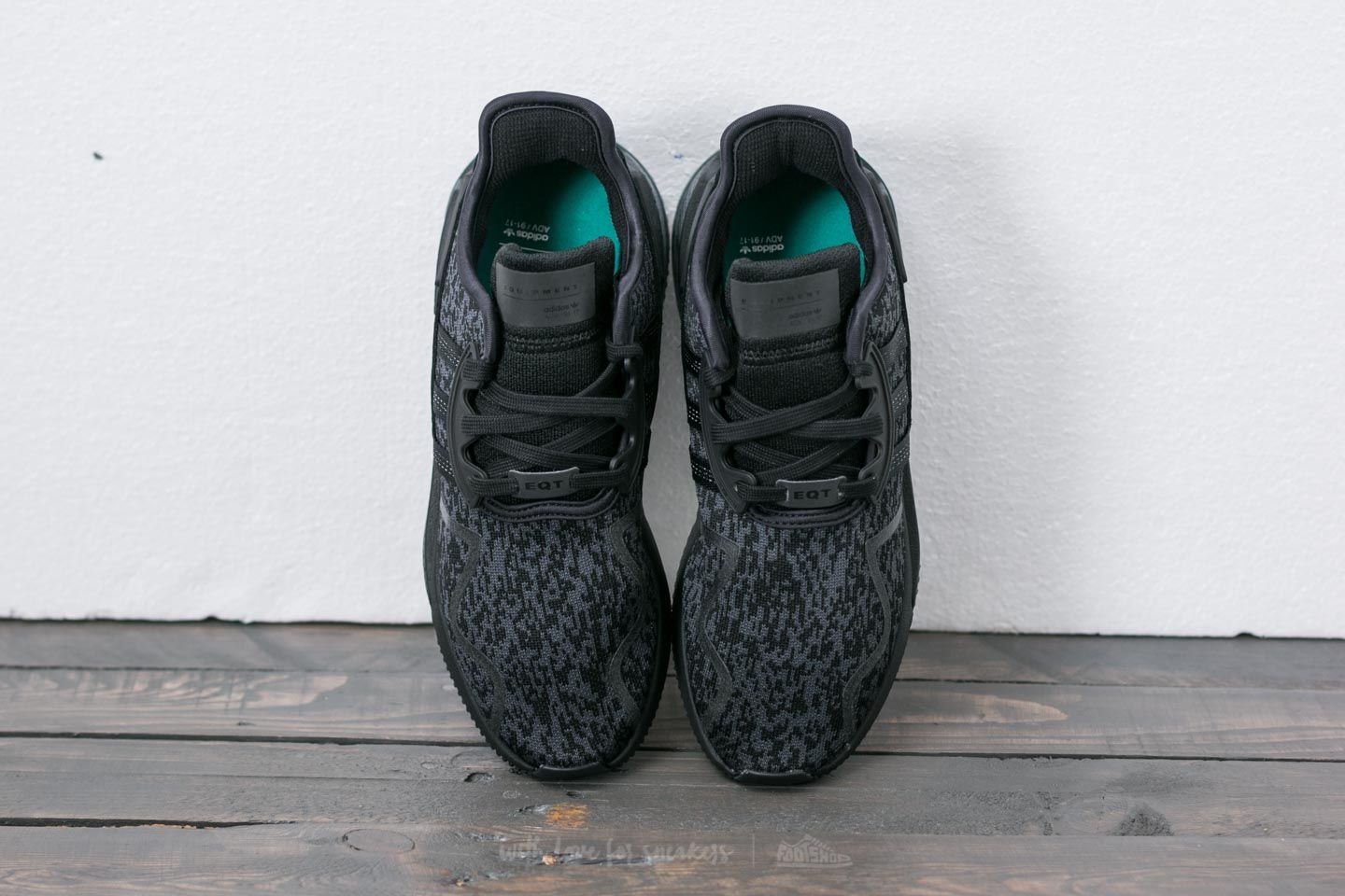 Eqt boost triple black on feet best sale