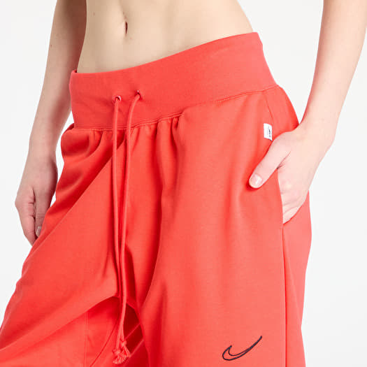 orange nike joggers womens