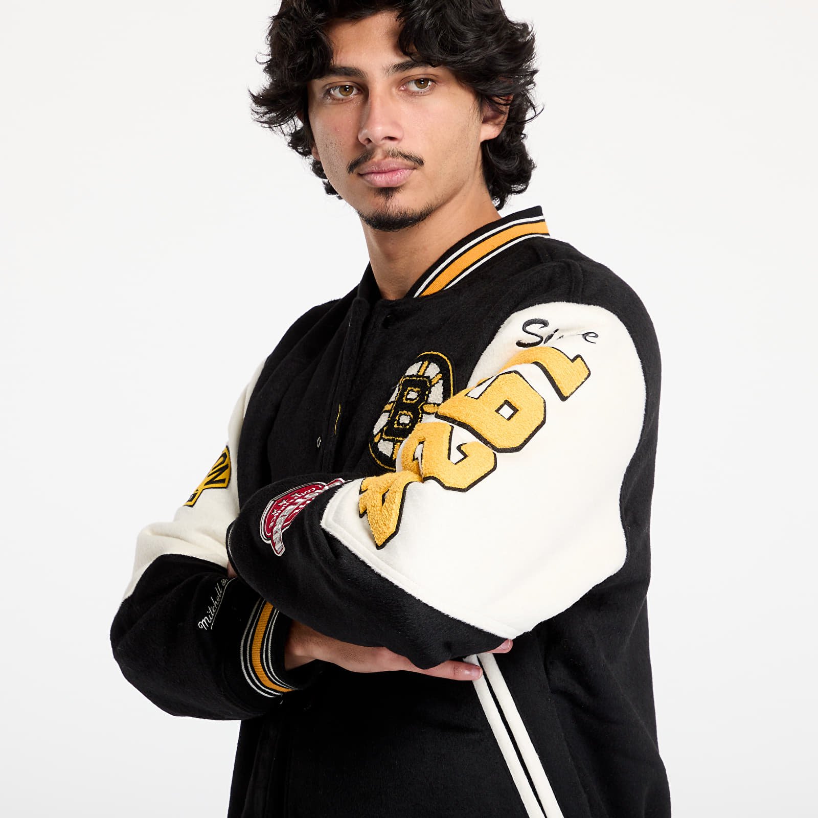 Bombery Mitchell & Ness NHL Team History Varsity Jacket Current Logo Bruins Black