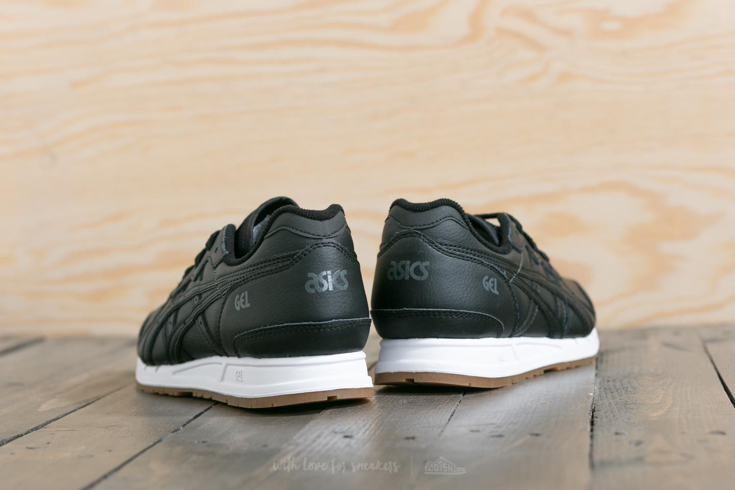 Asics gel movimentum black sale