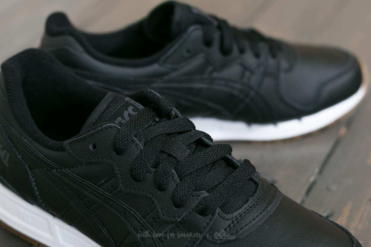 Asics gel movimentum black online