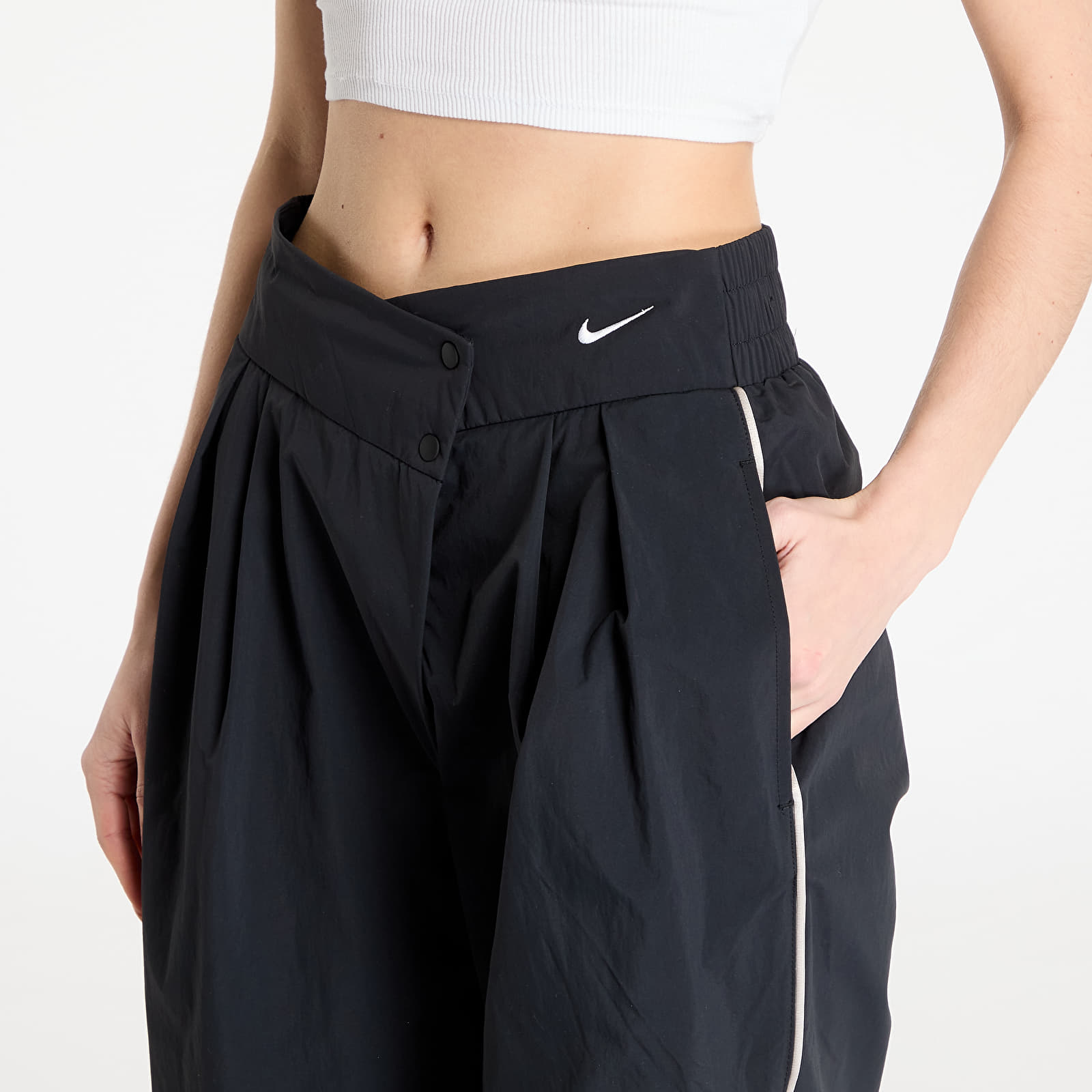 Šusťákové kalhoty Nike Sportswear Collection Women's Asymmetric Waist Trousers Black/ Lt Iron Ore/ White