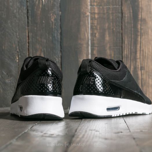 Nike thea black white jacquard hotsell