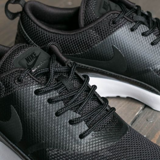 Nike thea all black deals