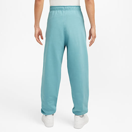 Jeans e pantaloni Nike Solo Swoosh Men s Fleece Pants Denim Turq White Footshop