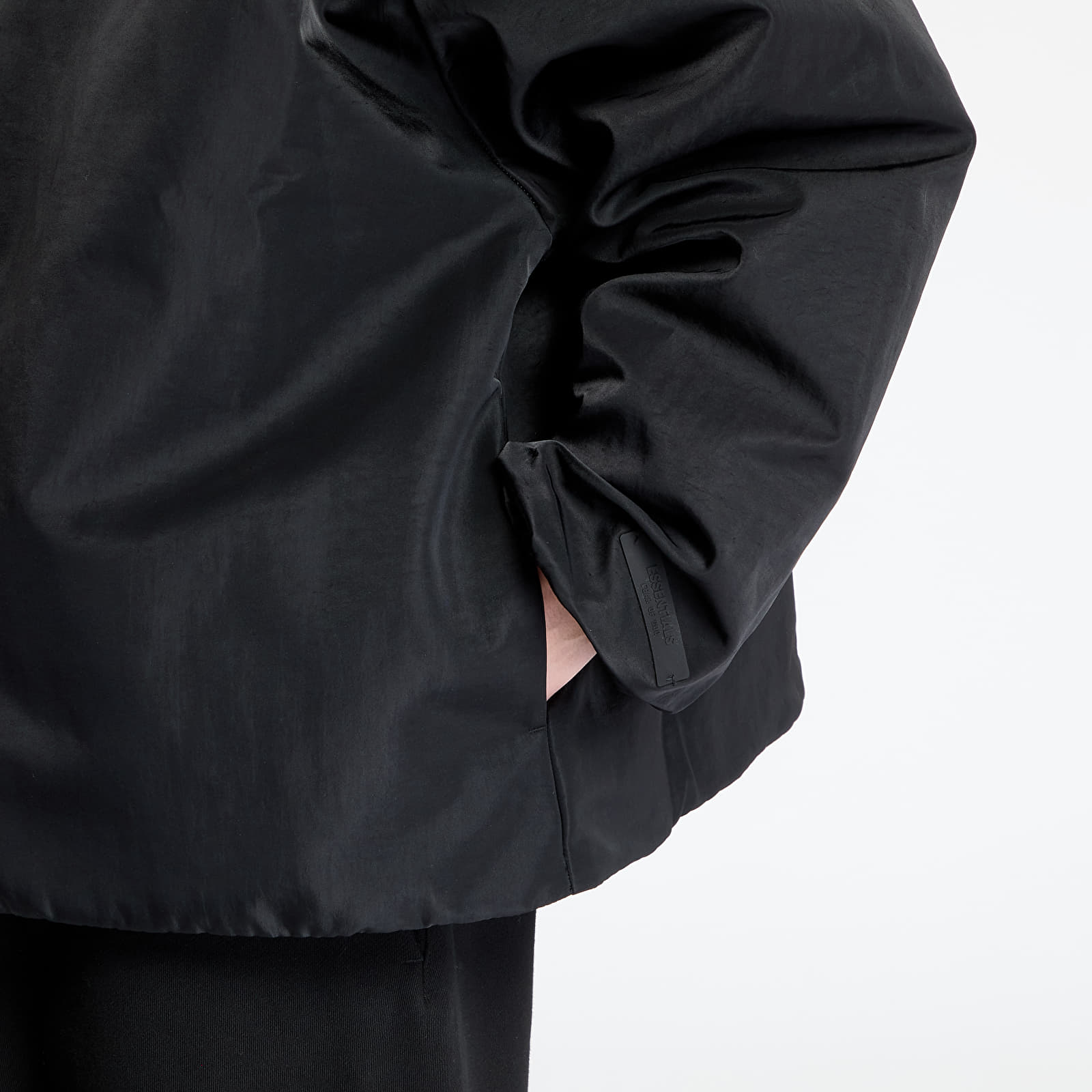 Men's jackets Fear Of God ESSENTIALS Textured Nylon Hooded Coaches Jacket Black
