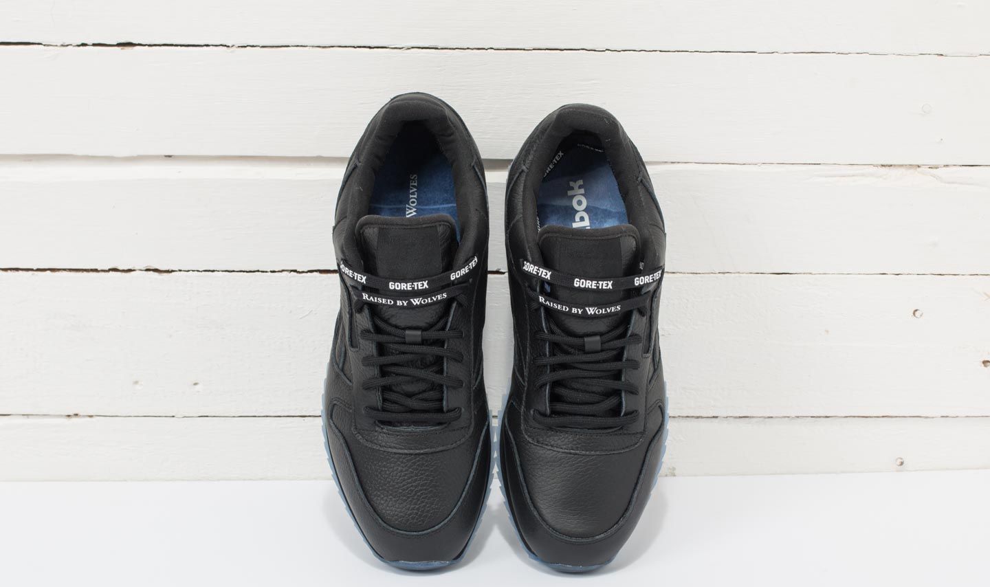 Reebok raised by wolves black hotsell