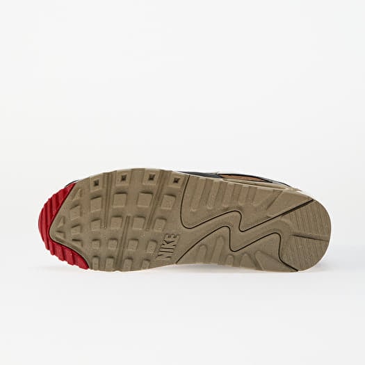 tan and red nike shoes