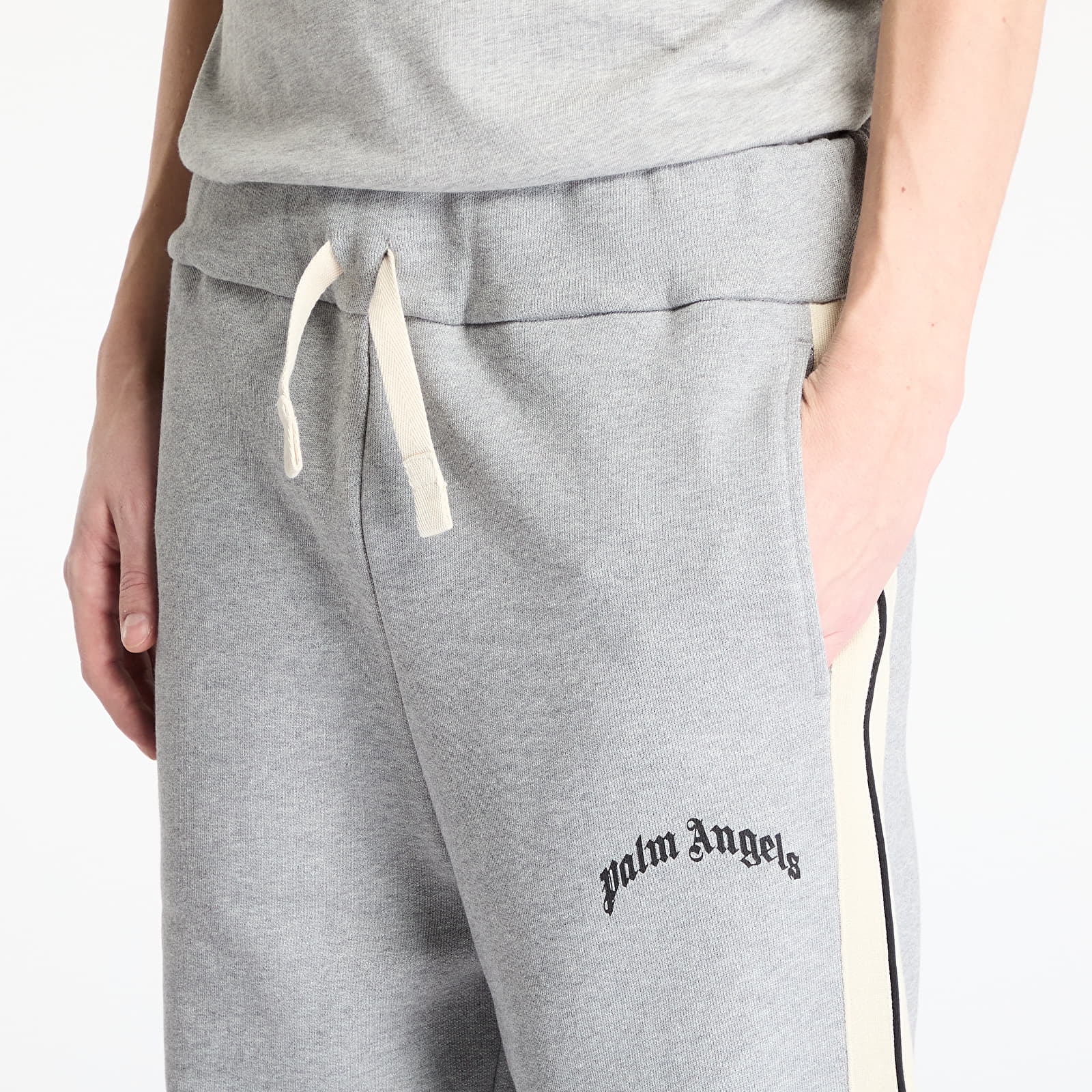 Férfi melegítőnadrágok Palm Angels Curved Logo Track Sweatpants Grey Melange