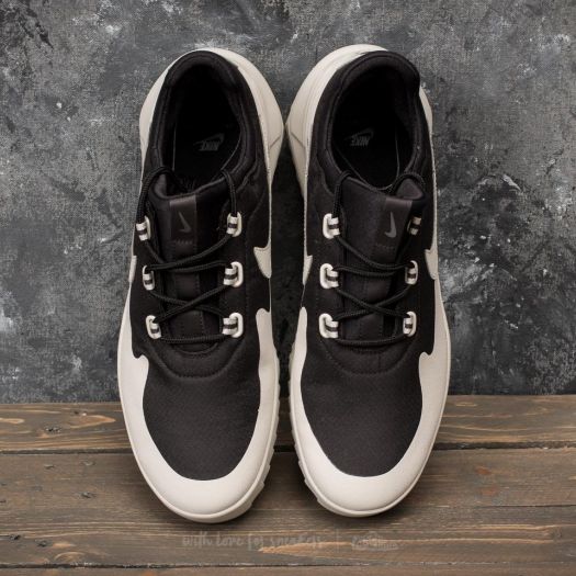 Nike air best sale wild black white