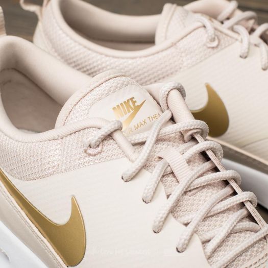 Nike thea j top