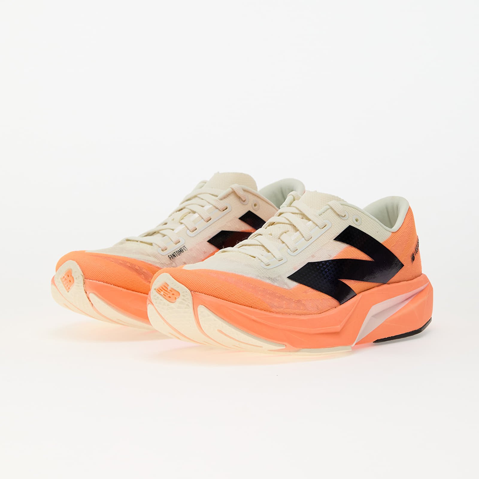 Zapatillas Hombre New Balance Fuelcell Rebel v4 Hot Mango/ Angora/ Black