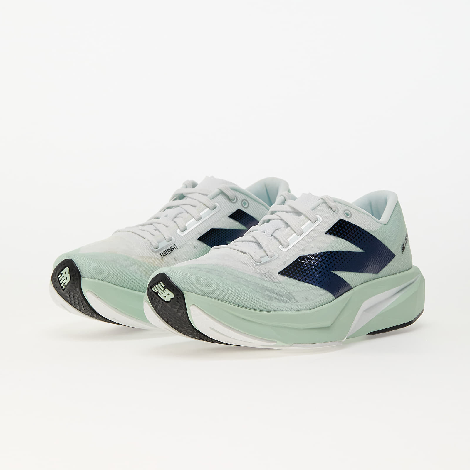 Pánské tenisky a boty New Balance FuelCell Rebel v4 White/ Light Green/ Blue