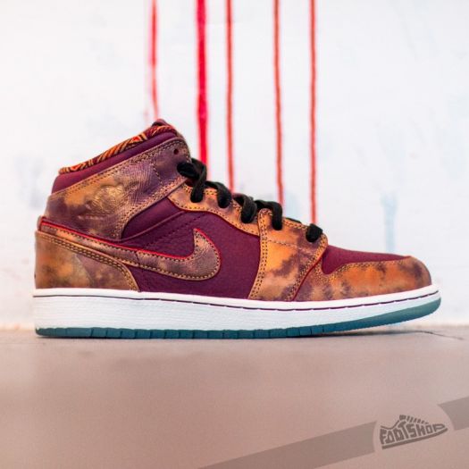 garnet and gold nike shoes