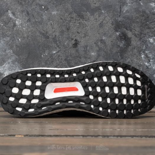 Adidas ultra boost 2025 core black raw gold