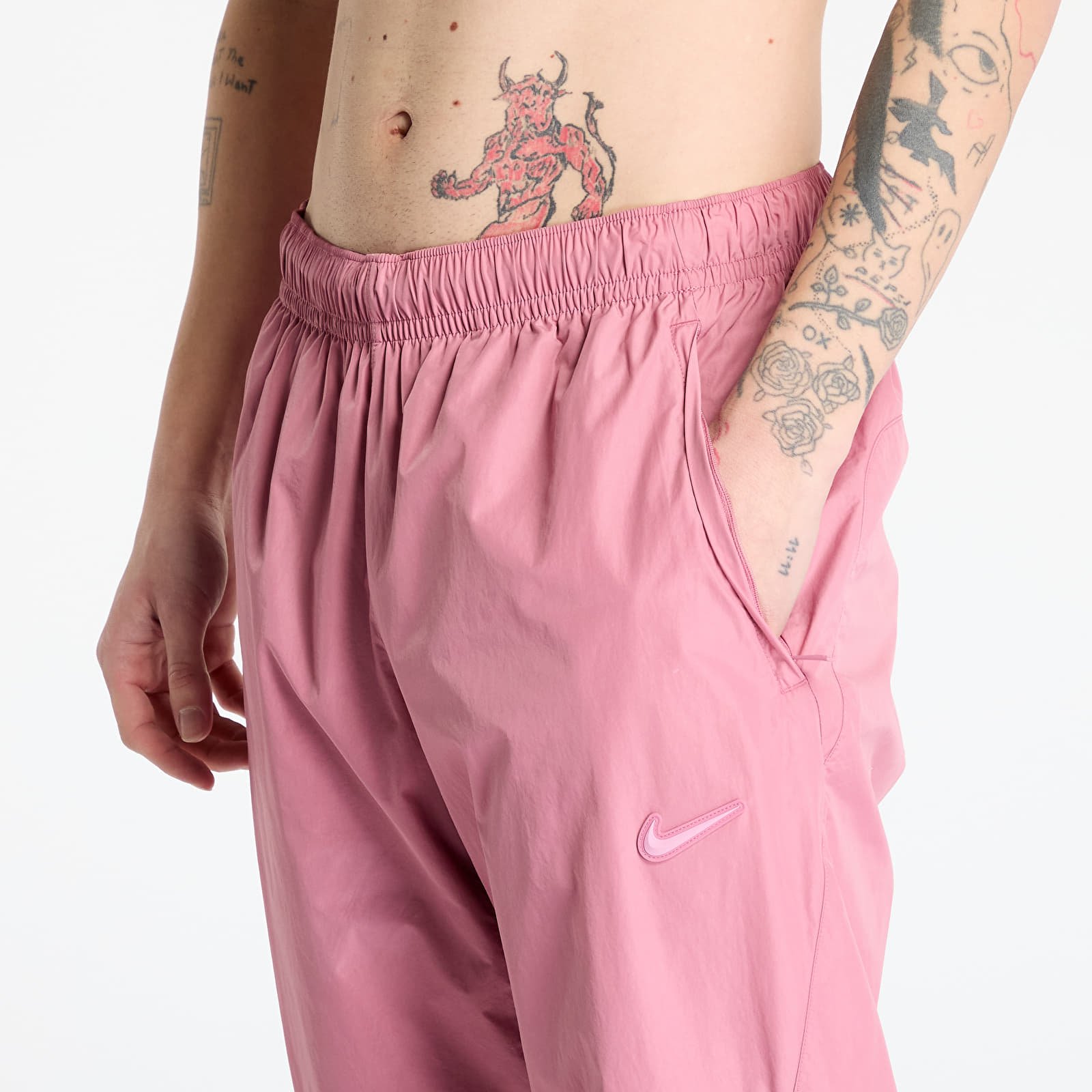 Hosen für Männer Nike x NOCTA Northstar Nylon Track Pants Desert Berry/ Elemental Pink