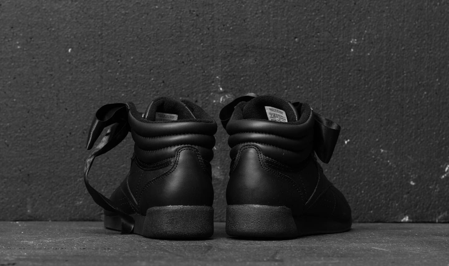 Reebok freestyle hi black mens hot sale