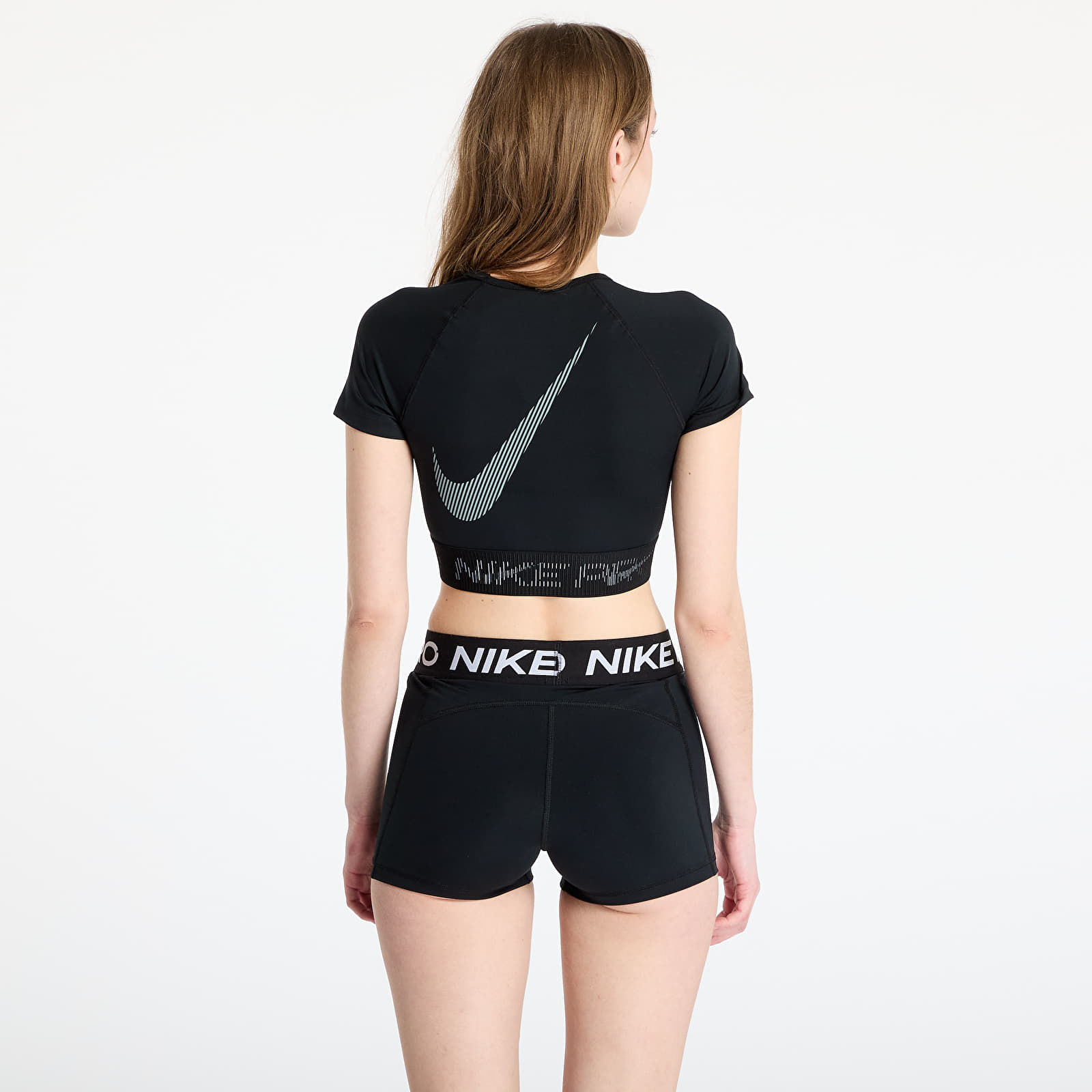 Sieviešu topi Nike Pro Women's Dri-FIT Short-Sleeve Cropped Graphic Top Black/ Cool Grey/ White