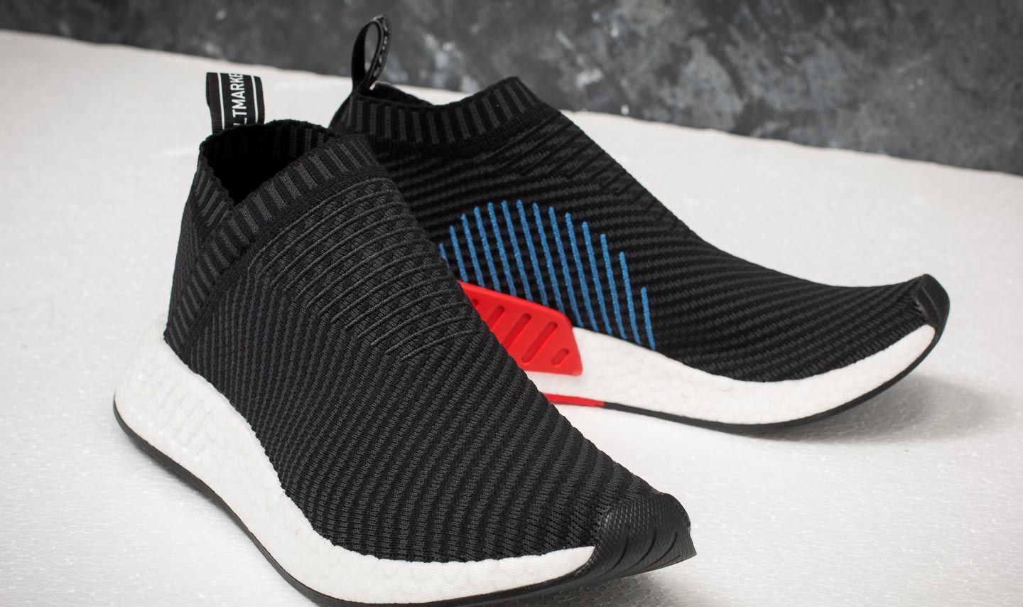Nmd_cs2 primeknit core black/carbon/red top