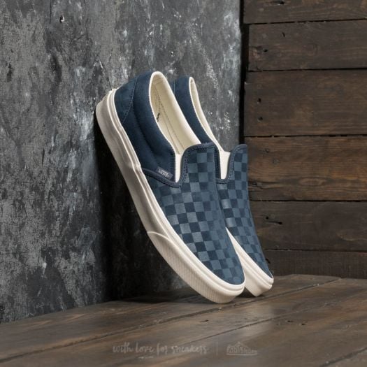 Vans slip on hotsell checker emboss