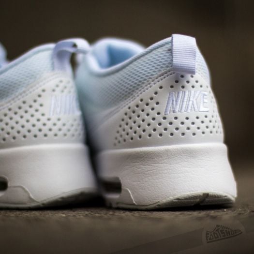 Nike thea triple white shop