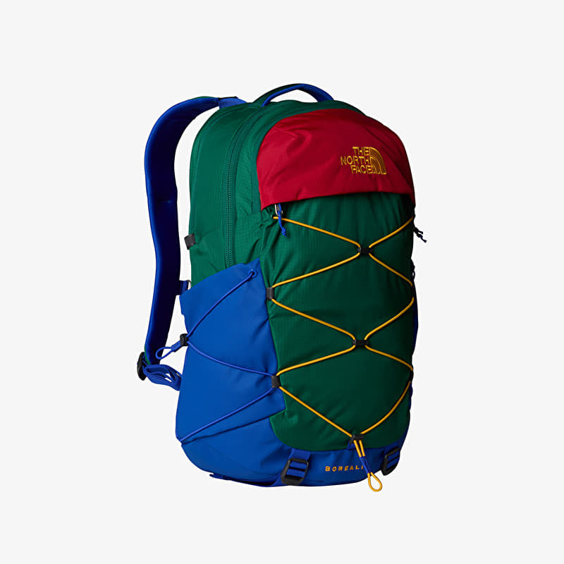 blue and yellow north face backpack K's Chuckwalla loader construction with a fleece lid and shaped zipper pulls makes the pack fun and easy to identify The North Face Youth Mini