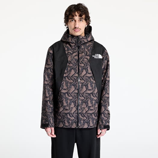 Giacca a vento The North Face Nse Shell Jacket UNISEX Print Smokey Brown Carabiner