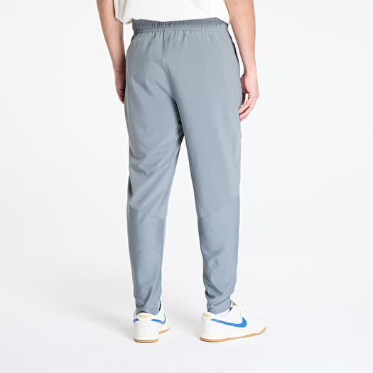 nike essential woven pants grey