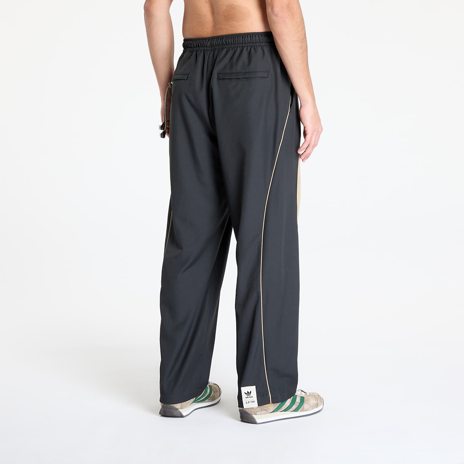 Pantaloni și blugi adidas Song For The Mute Spring Woven Pant Black/ Black