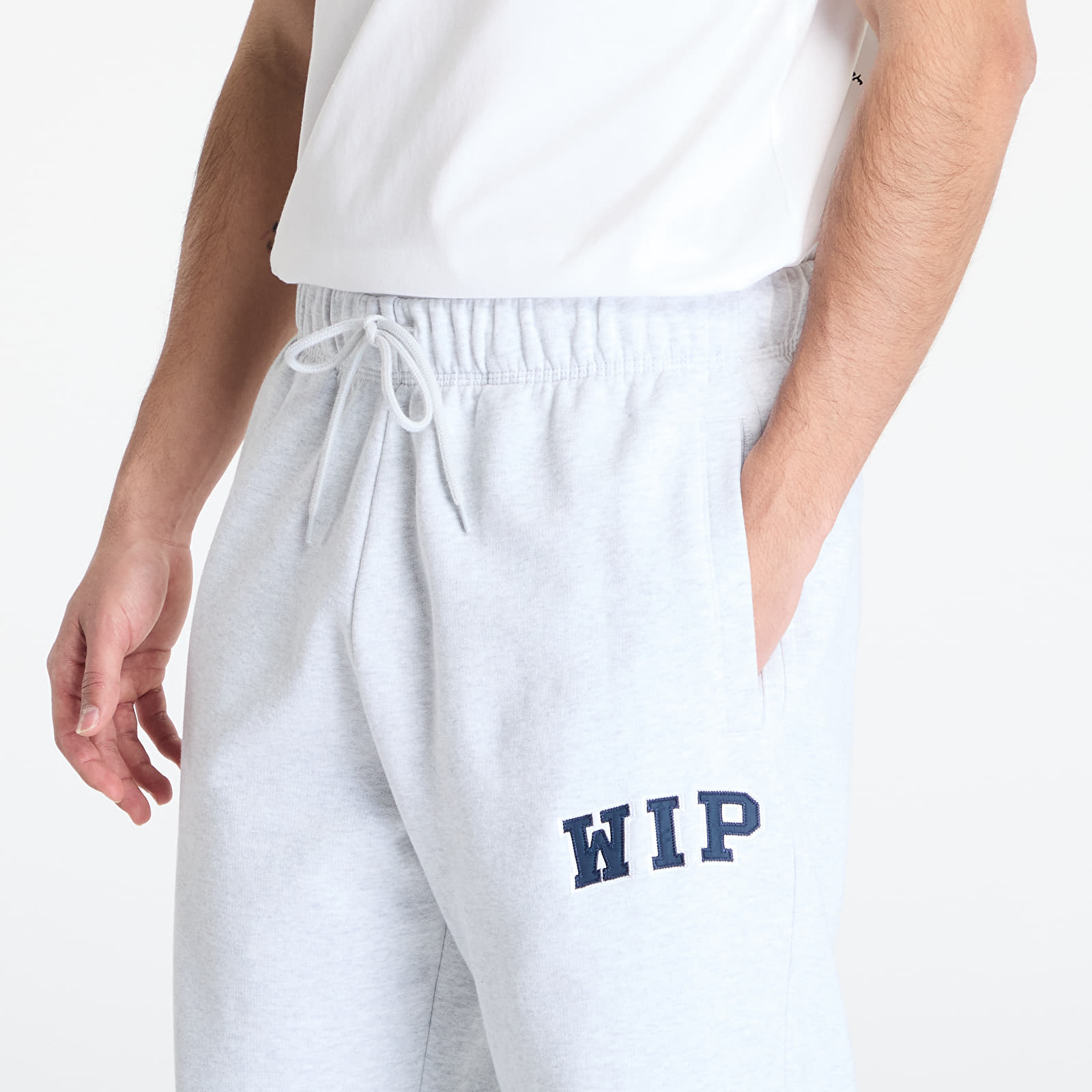 Meeste püksid Carhartt WIP WIP Sweat Pant Ash Heather Stone Washed