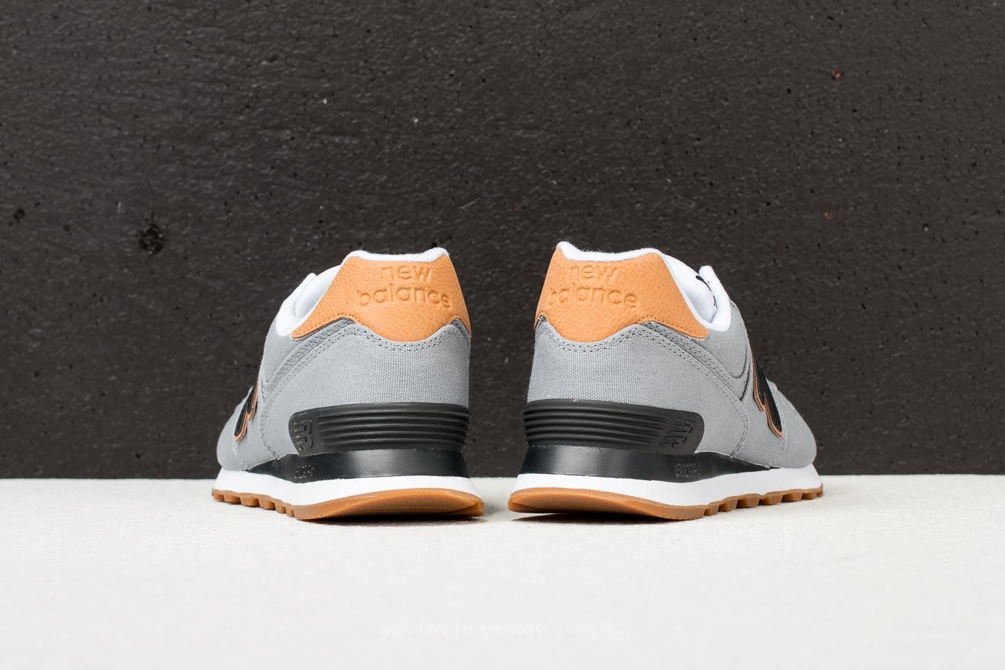 New balance 574 grau orange top
