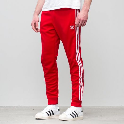 Adidas superstar hotsell track pants red