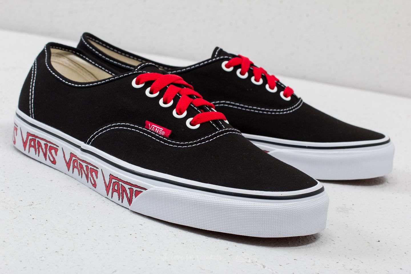 Vans authentic black and red store