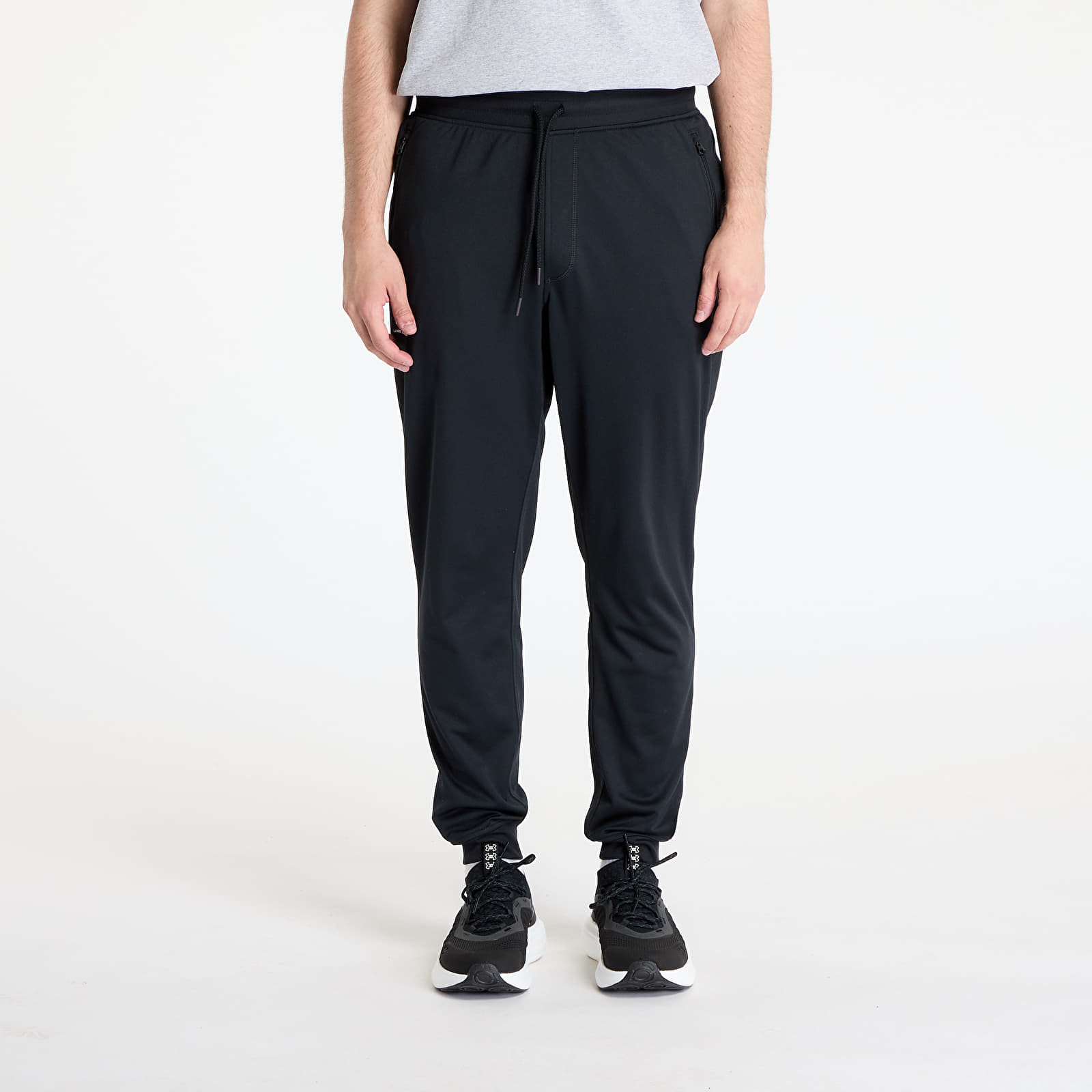Kalhoty Under Armour Sportstyle Tricot Jogger Black/ White