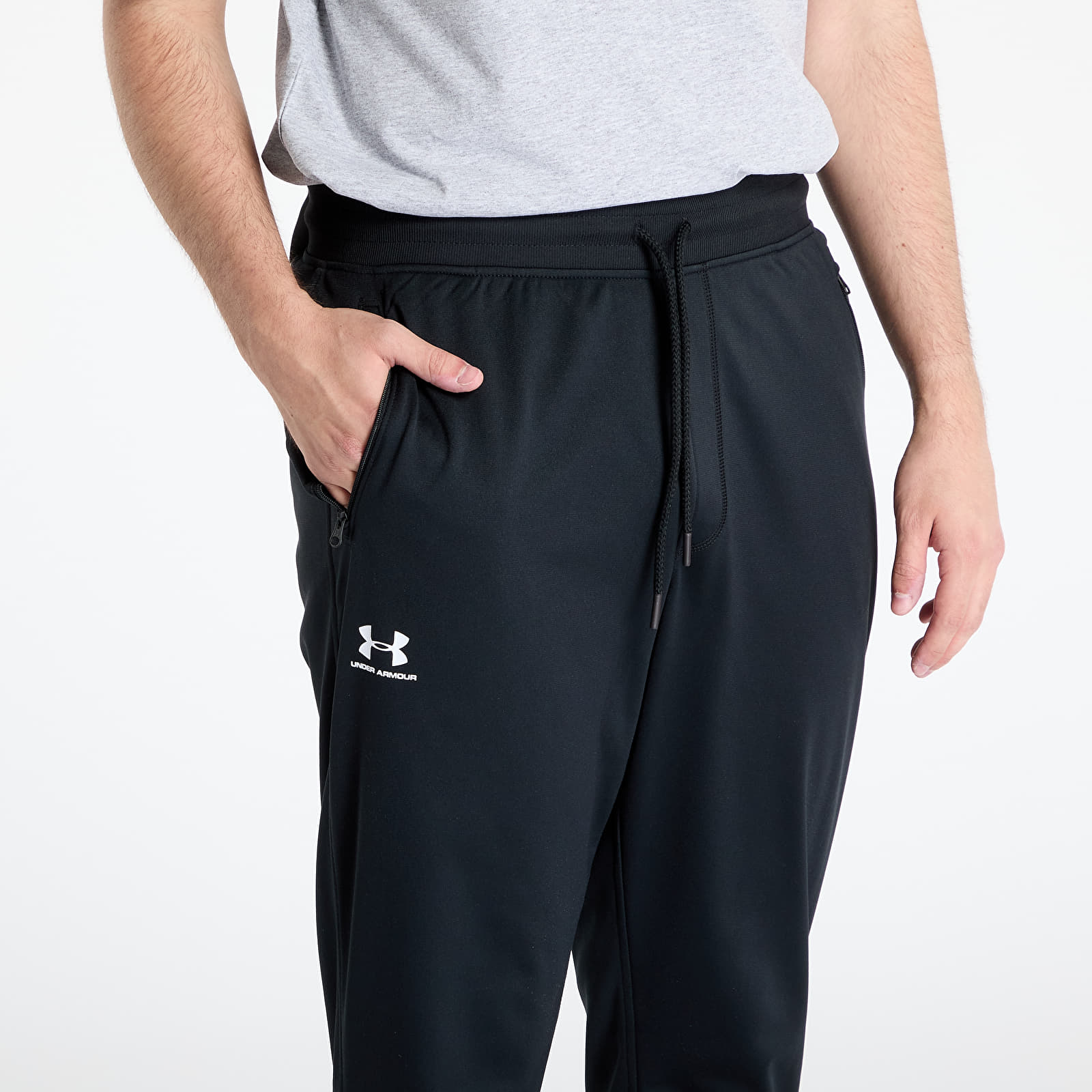 Kalhoty Under Armour Sportstyle Tricot Jogger Black/ White