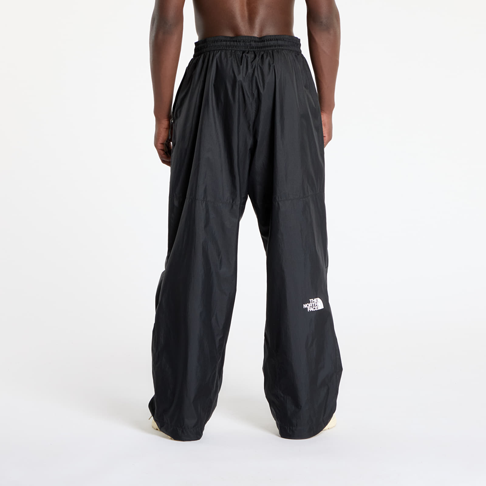 Bikses The North Face Nse Wind Track Pant UNISEX TNF Black