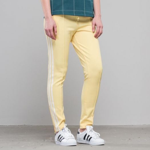 Adidas originals adicolor superstar track pants yellow 2025