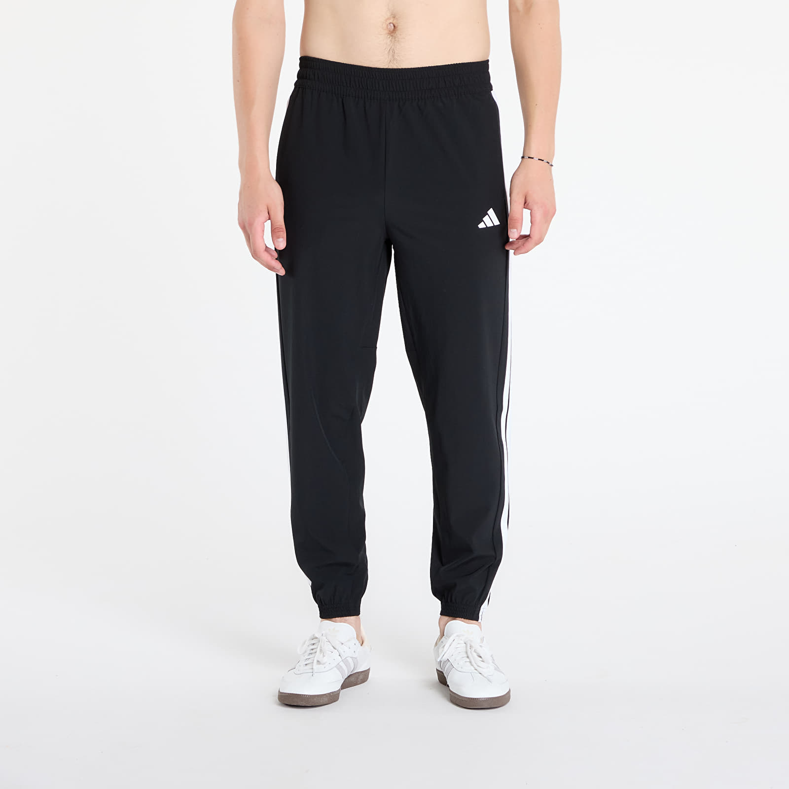 Byxor för kvinnor adidas Train Essentials 3-Stripes Woven Joggers Black/ White