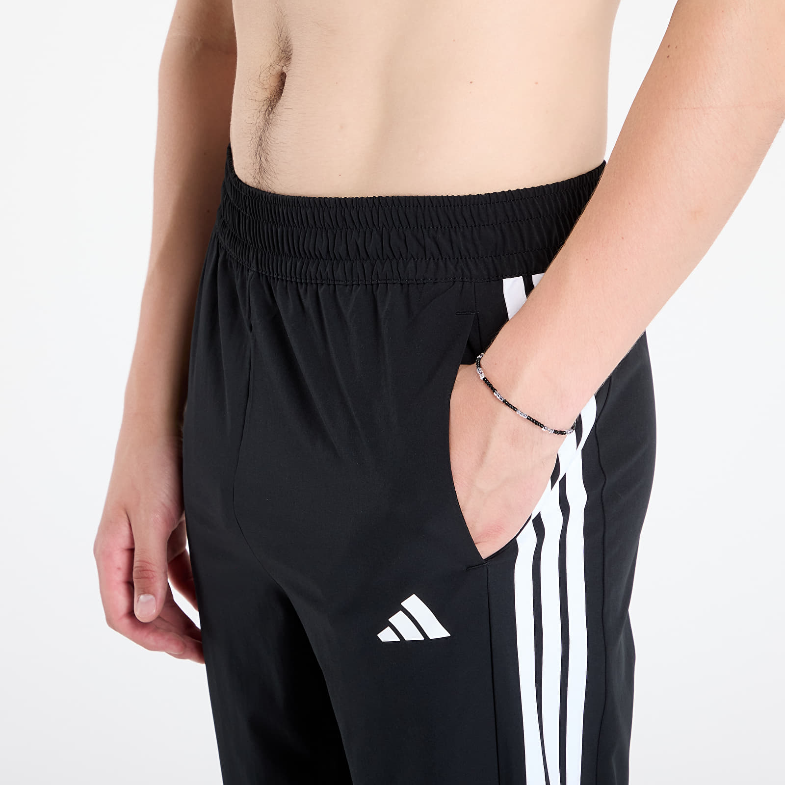 Byxor för kvinnor adidas Train Essentials 3-Stripes Woven Joggers Black/ White