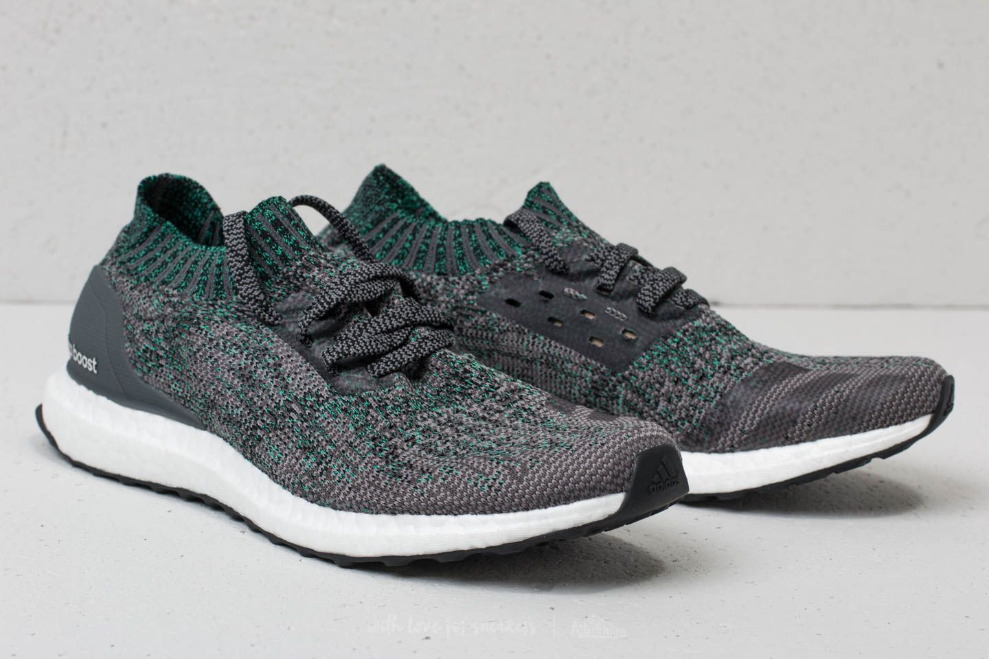Ultra boost uncaged grey green hotsell