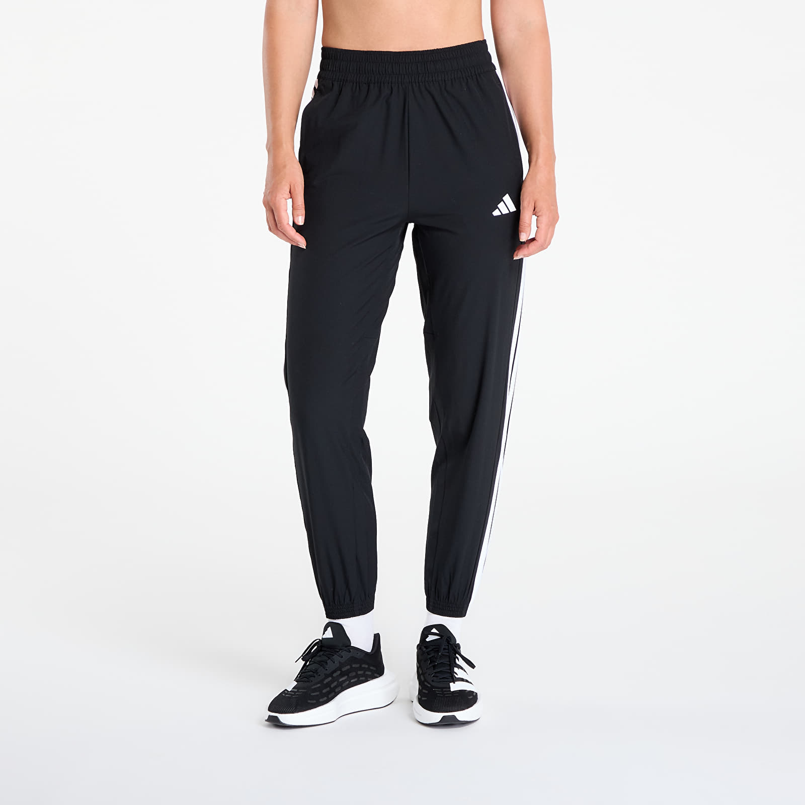 Byxor för kvinnor adidas Train Essentials 3-Stripes Woven Joggers Black/ White