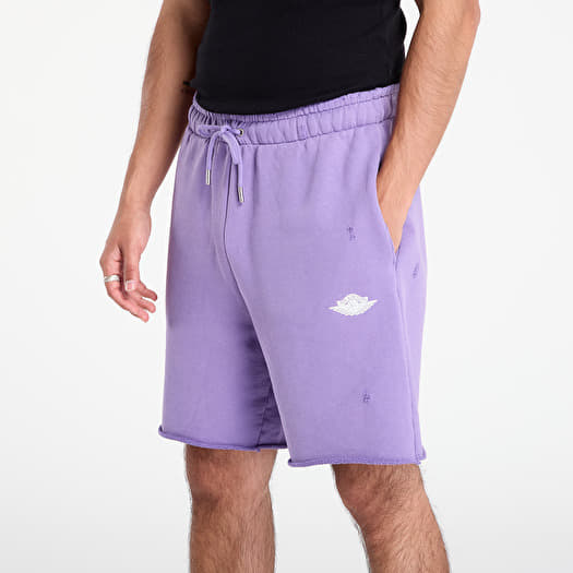 white and purple jordan shorts