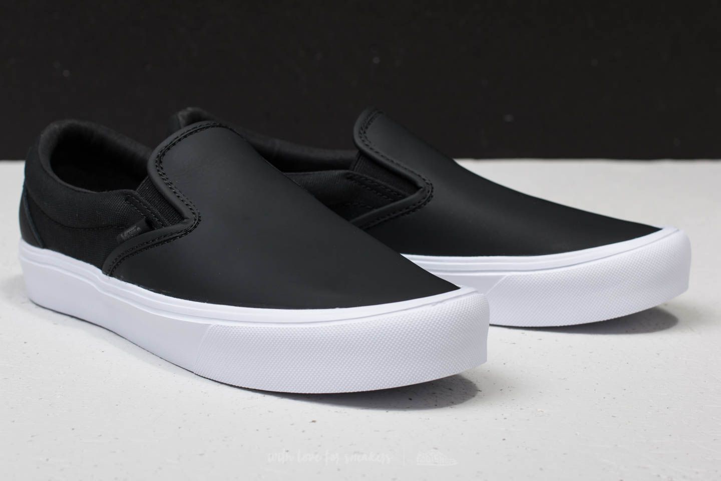Vans slip on lite best sale black