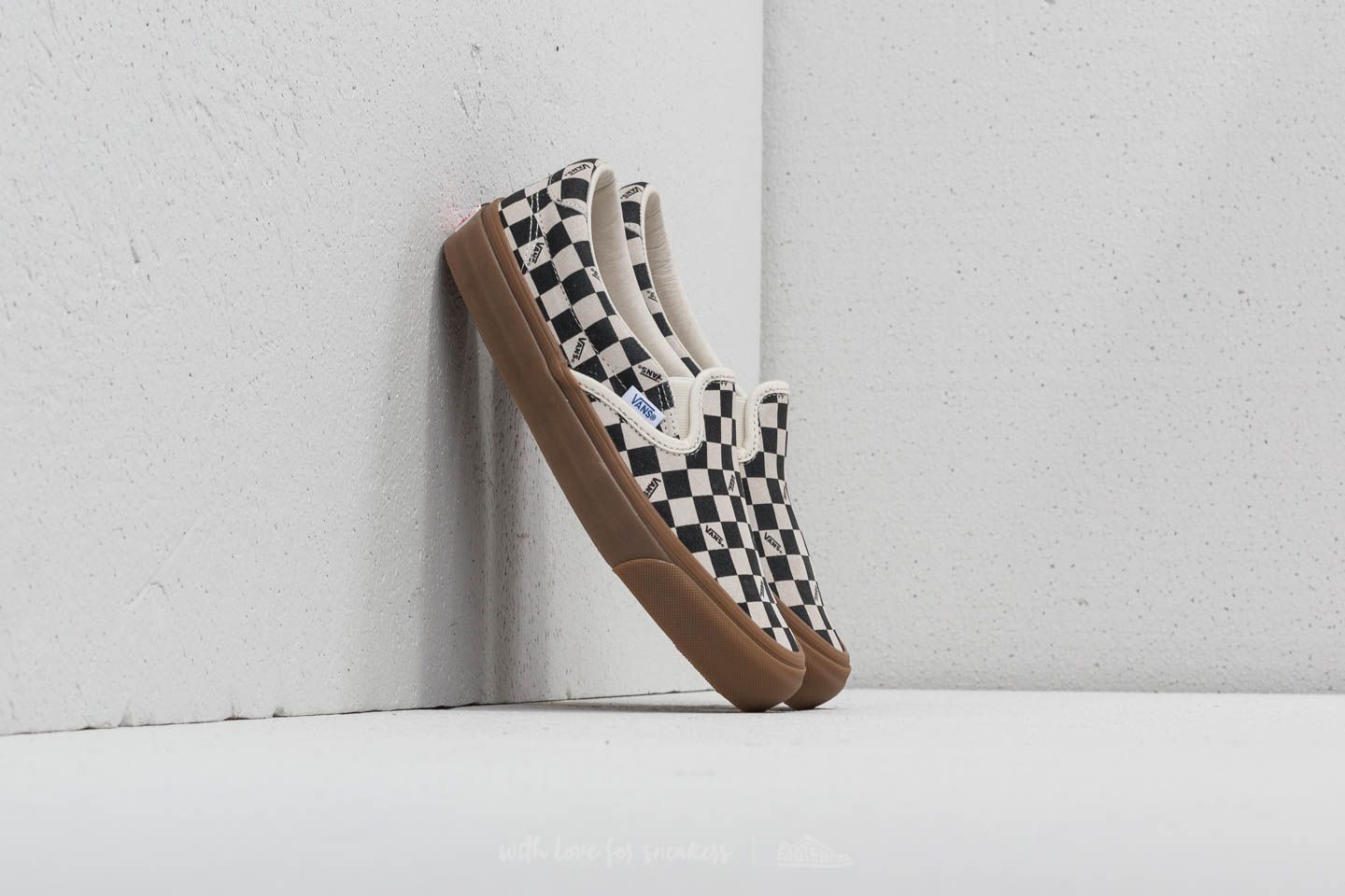 Vans slip on checkerboard gum sole sales
